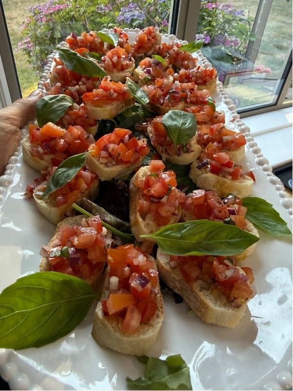 Tomato and basil bruschetta bites served at a private dining event in Nottingham