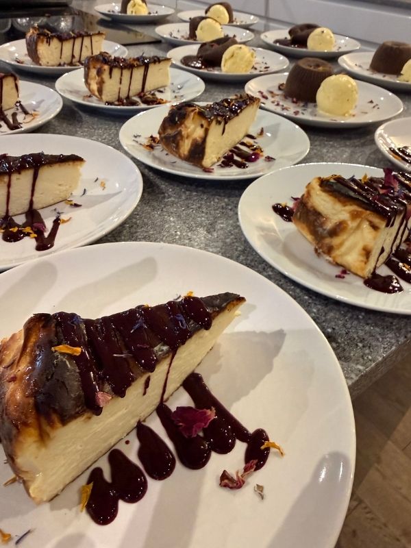 Baked cheesecake dessert plated by Chef Alpay for a private dinner in Nottingham