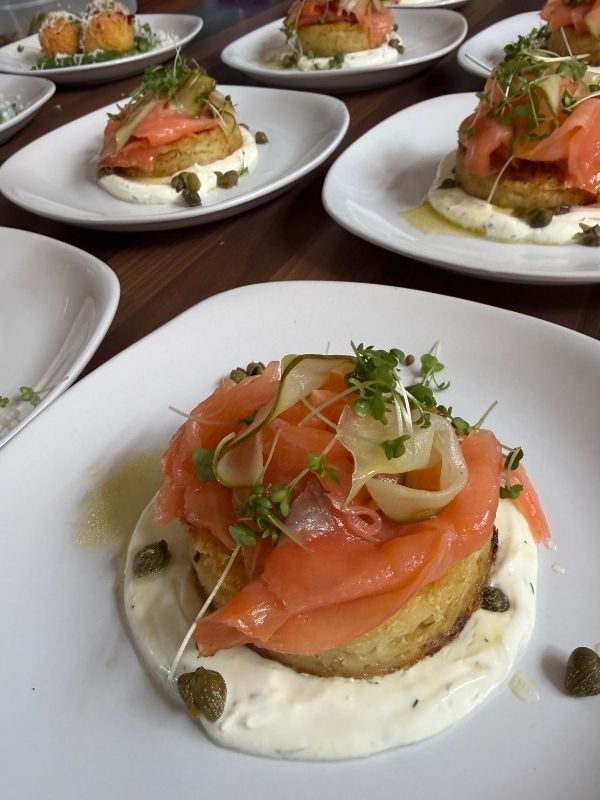 Smoked salmon on potato rösti with dill crème fraîche, served at a private dining event in Derbyshire